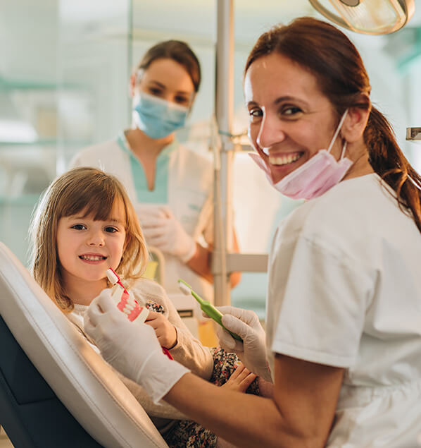 dentist with young patient