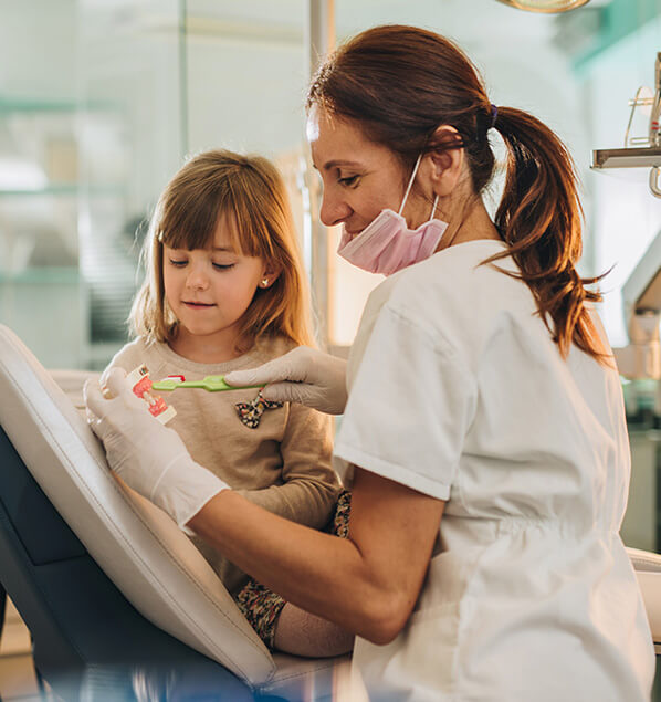 dentist with young patient