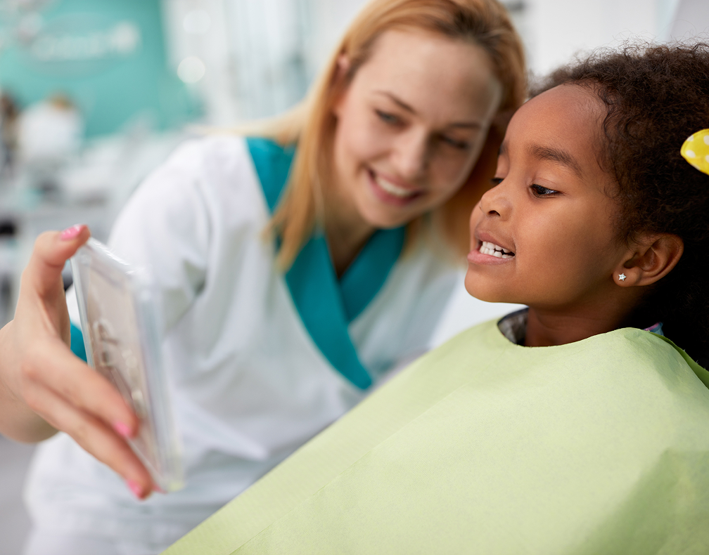 smiling girl at the dentist