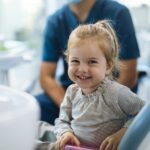 child in dental chair for laser dentistry