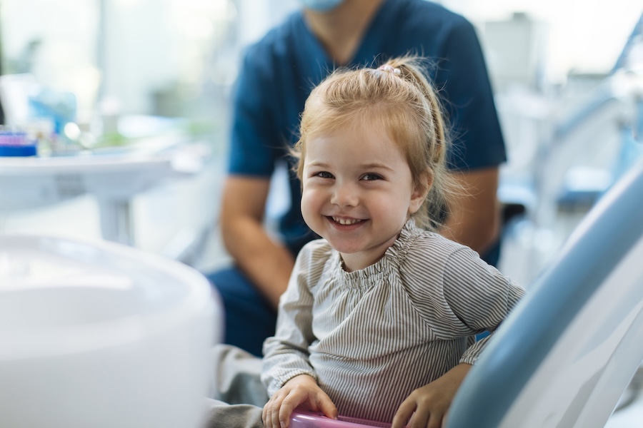 child in dental chair for laser dentistry
