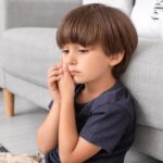 kid with a canker sore