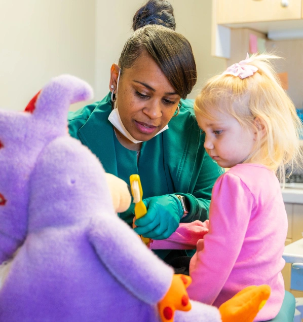 dentist with young patient